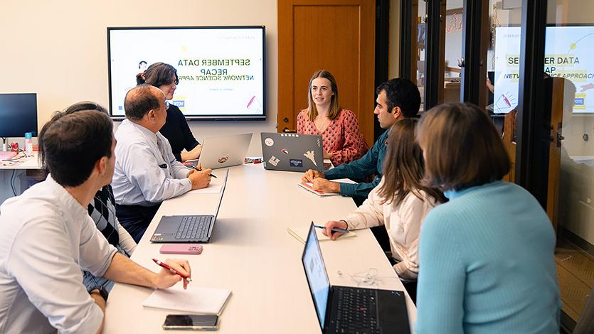 Image of computer science students presenting at the Marist Poll.